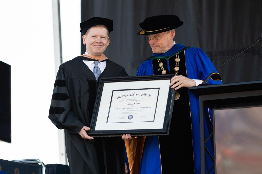 Paul Bascobert receiving honorary degree at commencement 